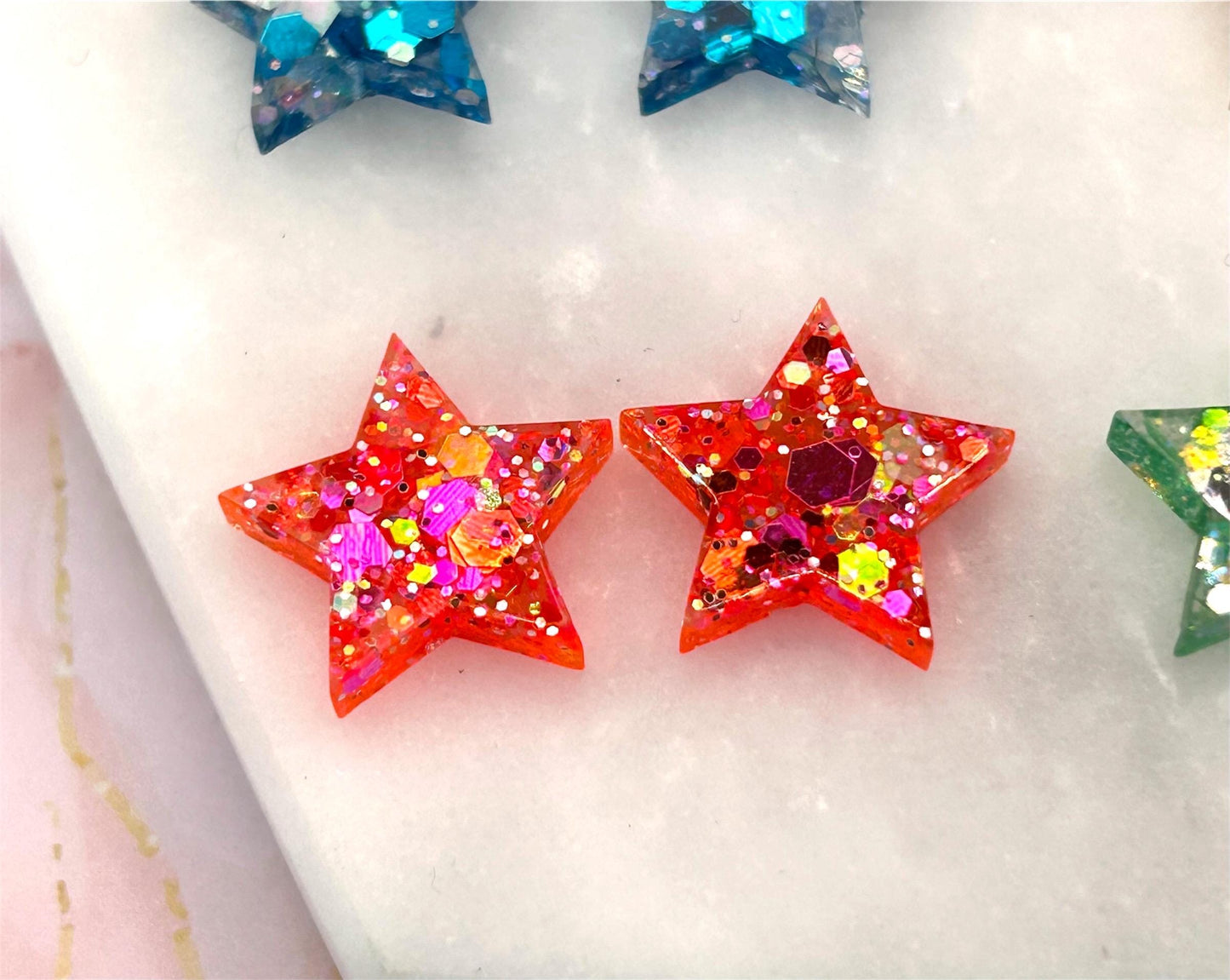Handmade Resin Star Stud Earrings with Glitter and Sterling Silver. Perfect for a gift or treat yourself!