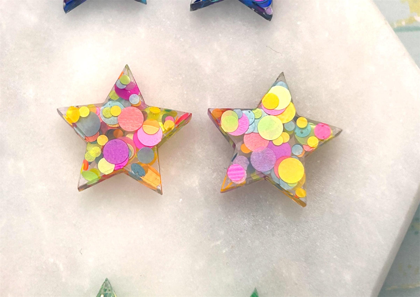 Handmade Resin Star Stud Earrings with Glitter and Sterling Silver. Perfect for a gift or treat yourself!