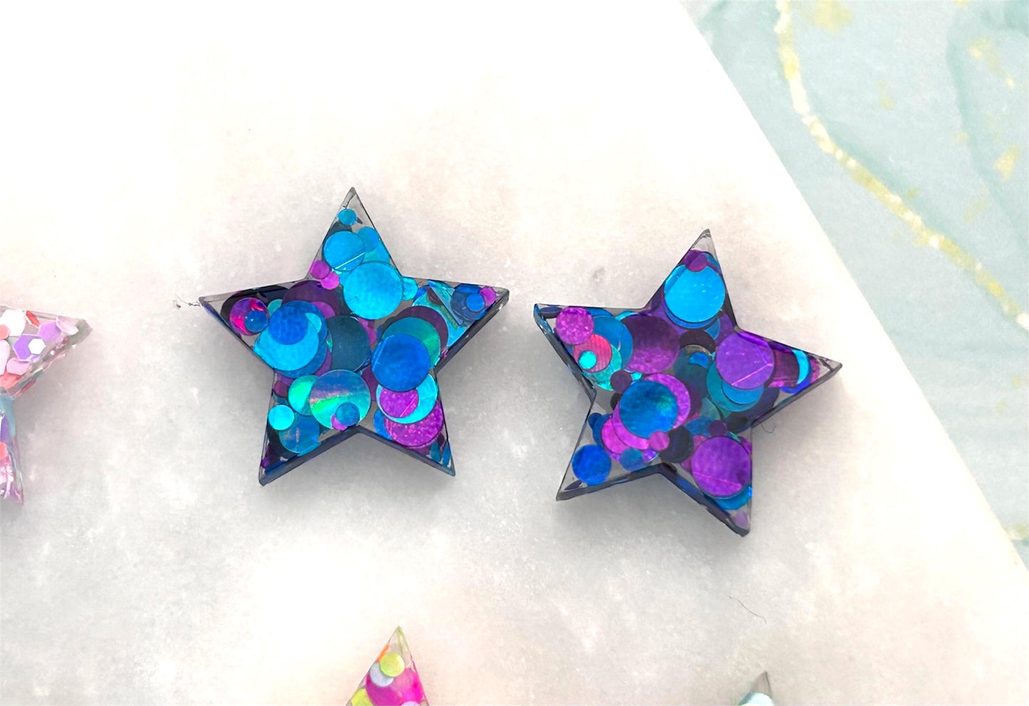 Handmade Resin Star Stud Earrings with Glitter and Sterling Silver. Perfect for a gift or treat yourself!