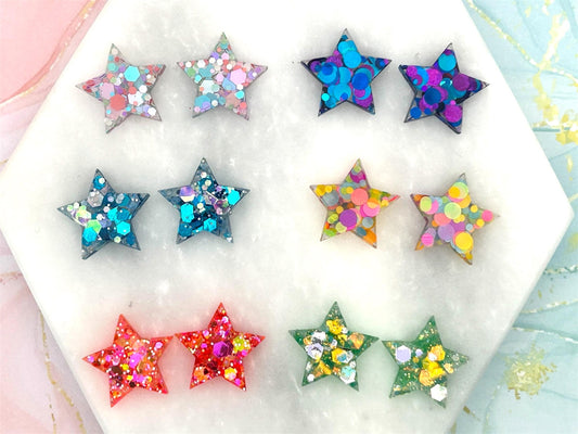Handmade Resin Star Stud Earrings with Glitter and Sterling Silver. Perfect for a gift or treat yourself!